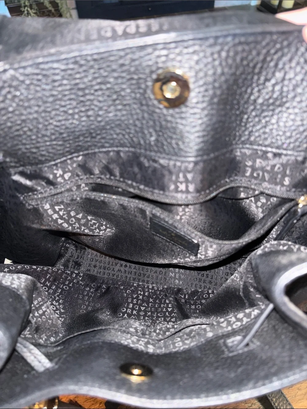 kate spade Black Pebbled Leather Drawstring Backpack Purse